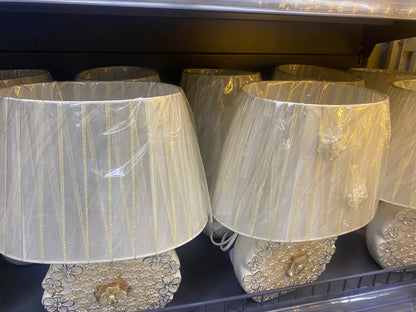 Modern Bedside Lamp – Warm & Elegant Lighting displayed in a cozy modern African home interior.