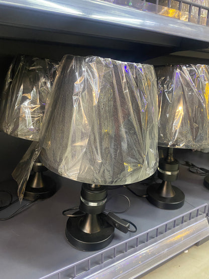 Modern Bedside Lamp – Warm & Elegant Lighting displayed in a cozy modern African home interior.